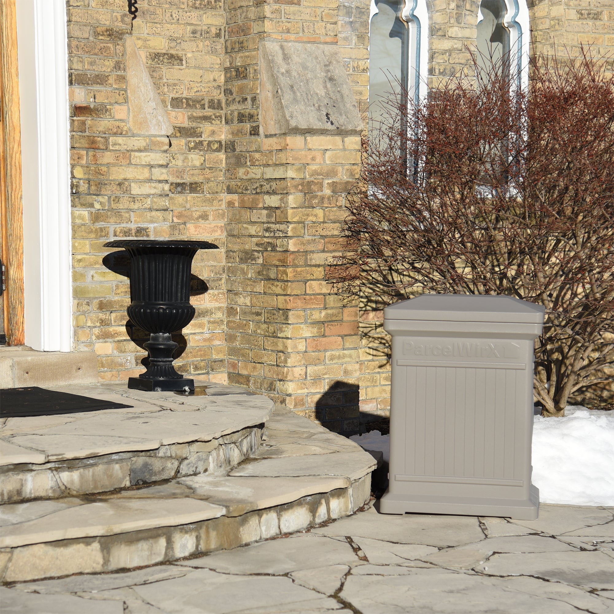ParcelWirx Standard vertical dropbox in prestige pewter on a front porch
