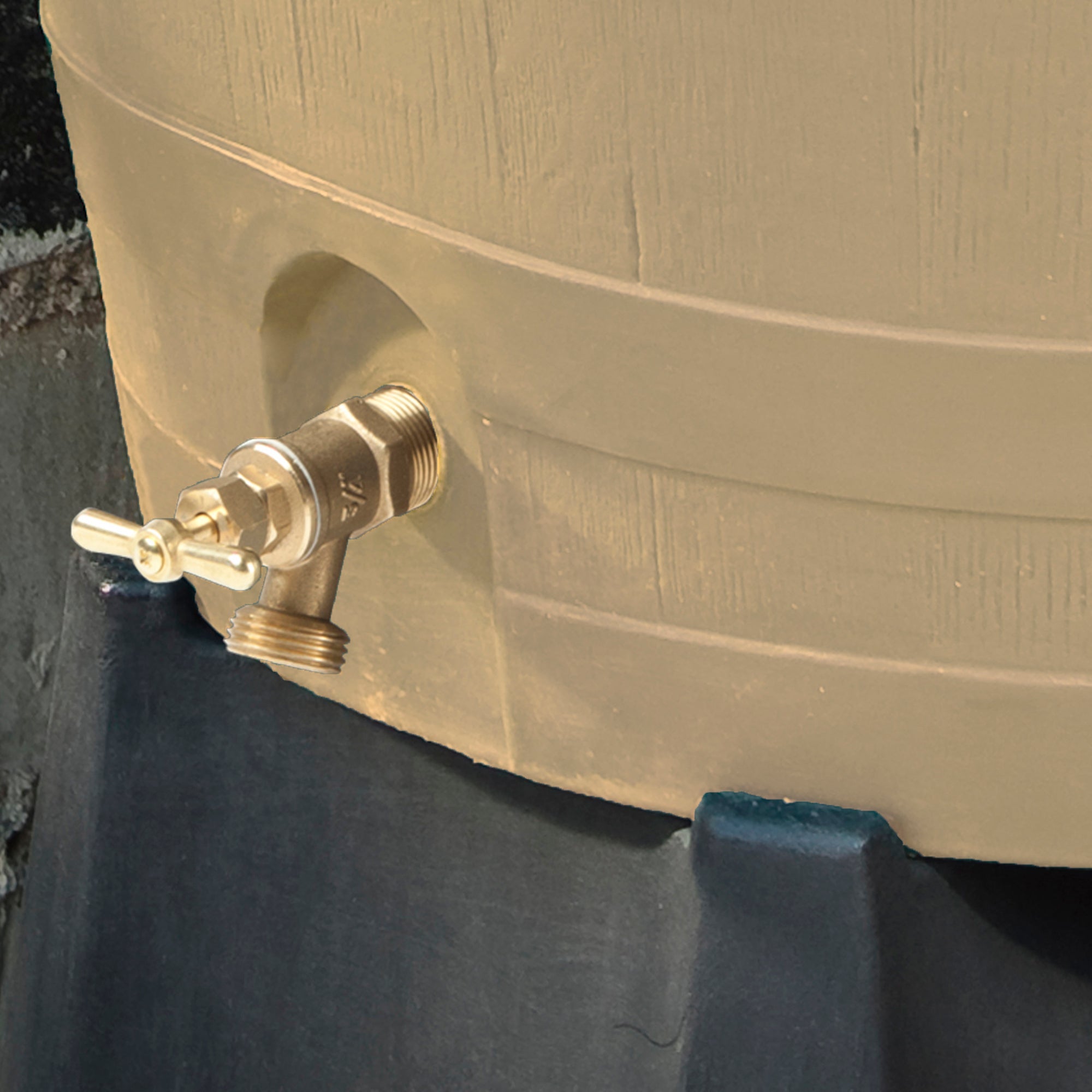 close up of brass spigot on oak rain barrel