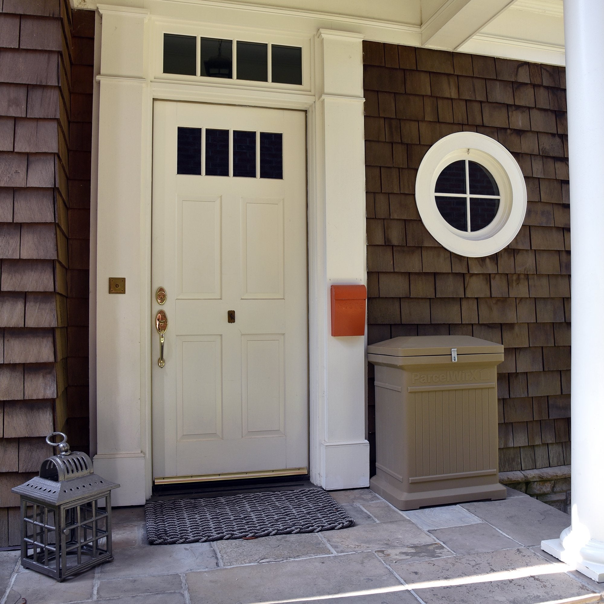 Oak ParcelWirx vertical premium on front porch beside front door